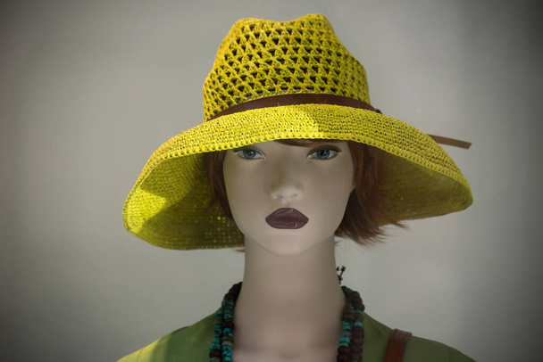 Closeup of summer hat on the head of mannequin in a fashion store showroom - Fotografie, Obrázek