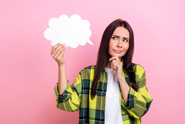 Portrait of thoughtful minded person long hairstyle wear yellow jacket finger on chin look at mind cloud isolated on pink color background. - Foto, Imagen
