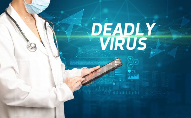 doctor writes notes on the clipboard with DEADLY VIRUS inscription, medical diagnosis concept - Fotó, kép