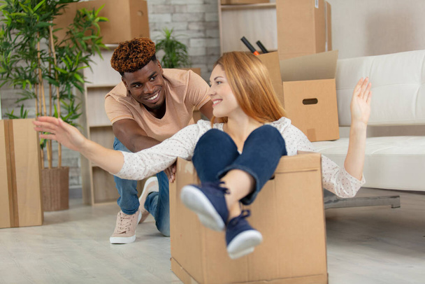 young couple moving in at new home - Photo, Image
