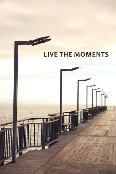 Live the moments, affirmation. Beautiful view of pier near sea outdoors - Fotografie, Obrázek