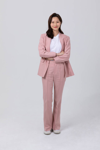 business concept korean young woman, standing. studio shot - Fotó, kép