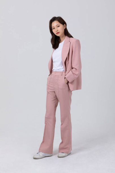 business concept korean young woman, standing. studio shot - Fotó, kép