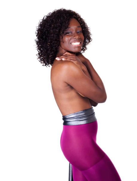 Attractive African American Woman Topless With Arms Covering Breasts Wearing Purple Tights On White Background - Foto, Imagen