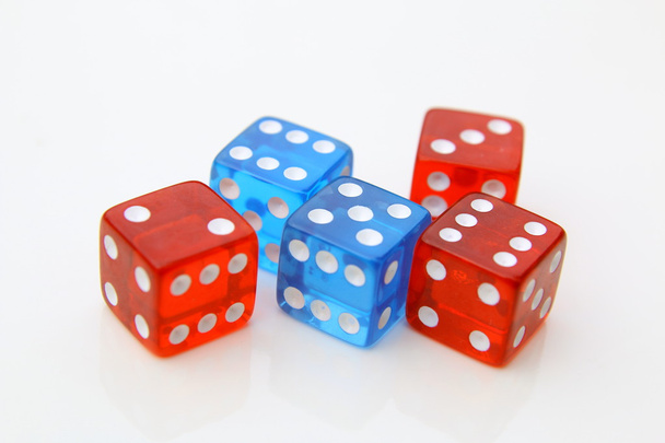 red and blue dices - 写真・画像