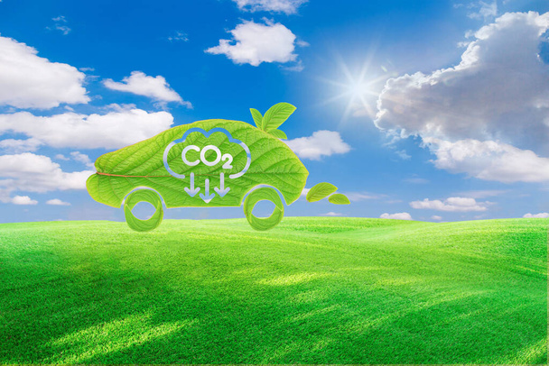 Electric Vehicle Concept in Green Environment Concept. Reduce CO2 emissions to limit climate change and global warming. Low greenhouse gas levels, decarbonize, net zero carbon dioxide footprint.  - Fotoğraf, Görsel