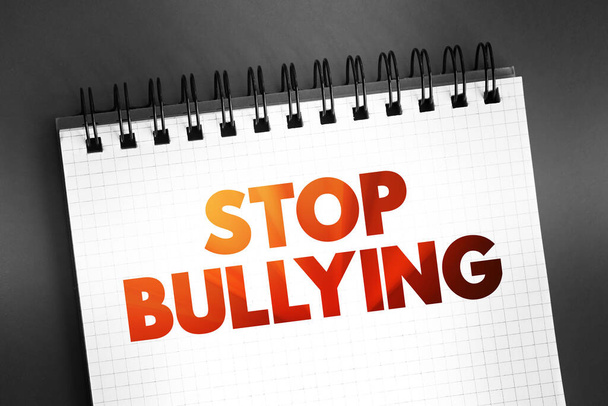 Stop Bullying text quote on notepad, concept background - Foto, Imagen