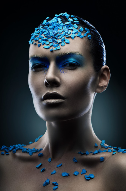 Woman with blue stones - Fotoğraf, Görsel