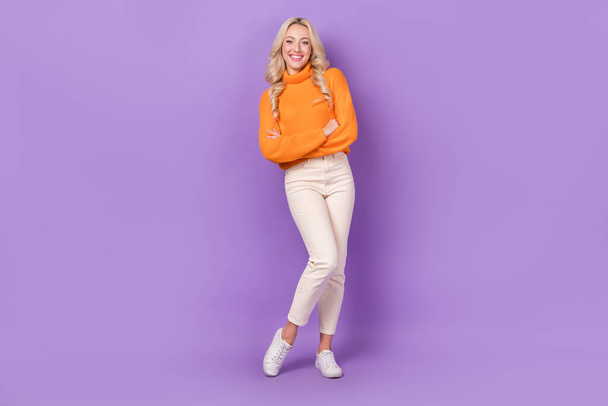 Full length photo of lovely satisfied glad person crossed arms posing isolated on violet color background. - Φωτογραφία, εικόνα