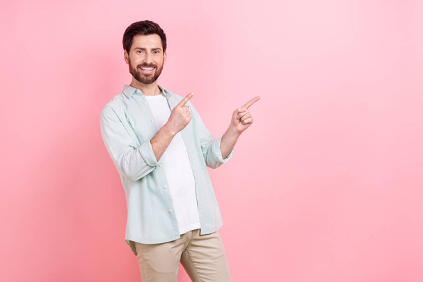 Photo of successful businessman wear indicate fingers empty space proposition cheap price service isolated on pink color background. - 写真・画像