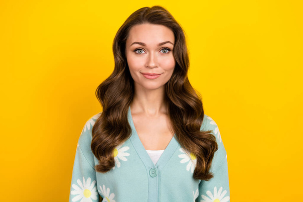 Portrait of satisfied friendly young lady nice wavy hairdress smile look camera isolated on yellow color background. - Fotó, kép