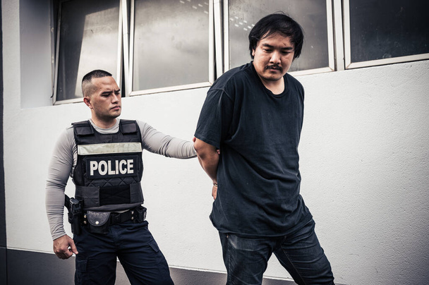 Police and thief concept,The cop catch criminals break the law - 写真・画像
