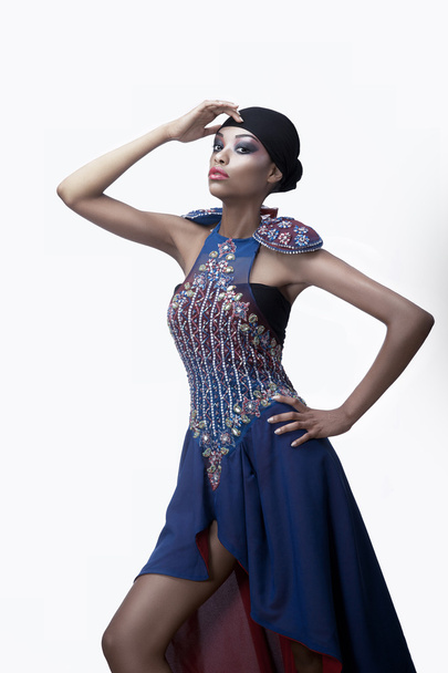 Woman in a blue creative dress - Valokuva, kuva