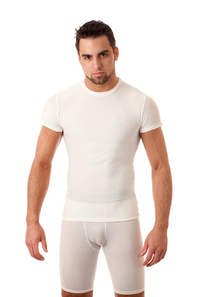 Man in tight wihite shirt and shorts. - Photo, image