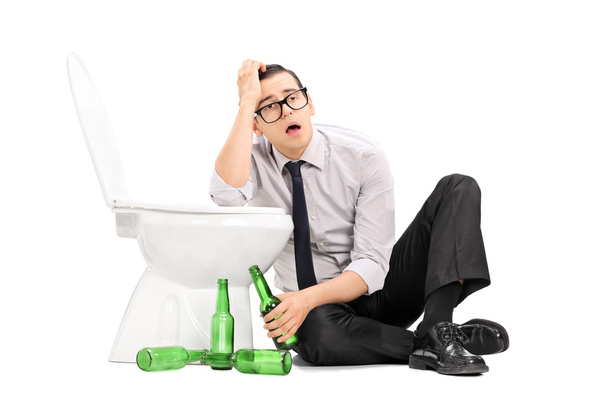 Drunk guy leaning on toilet - Fotoğraf, Görsel