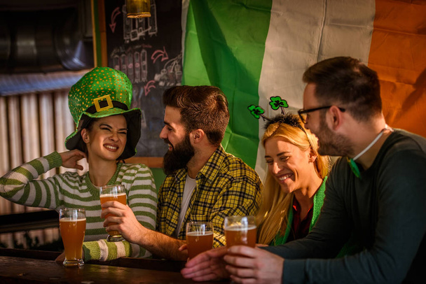 Group of Friends Celebrating St Patrick's Day in Beer Pub - Фото, зображення