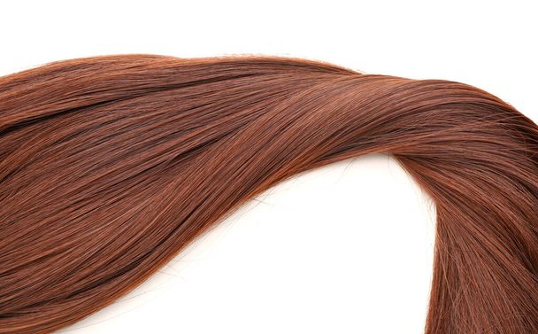 коричневе волосся на білому тлі
 - Фото, зображення