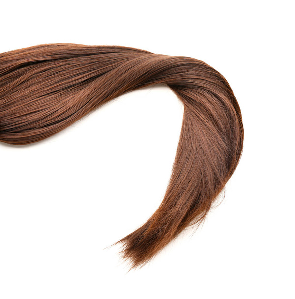 Brown hair on white background - Foto, Bild