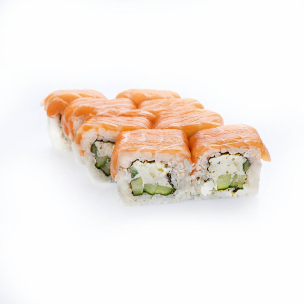 A group of sushi on a white background - Photo, image
