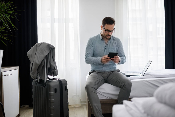 businessman working at hotel room - Photo, Image
