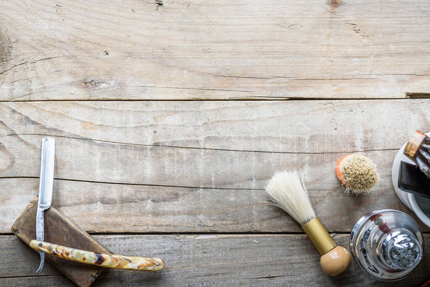 set of barber tools on wooden background - Foto, Imagem