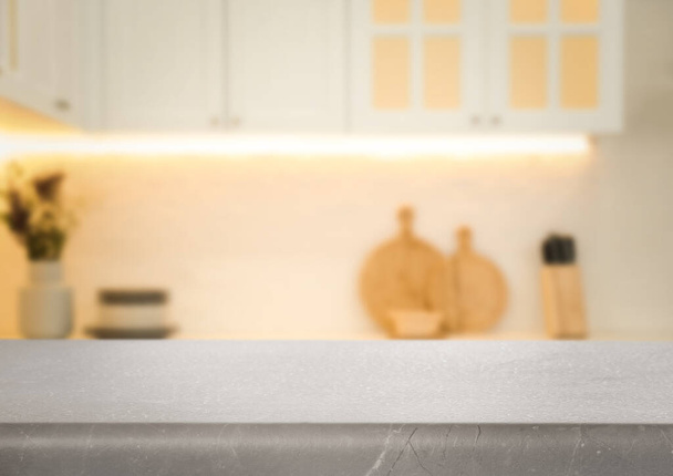 Empty grey table in beautiful kitchen. Space for design - Valokuva, kuva