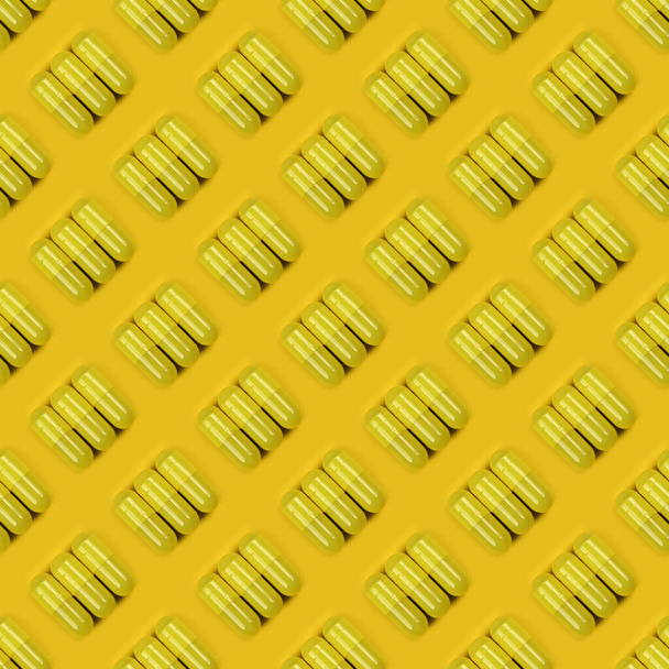Seamless pattern. Pharmaceutical pills, medicine for people's health to heal diseases. Yellow tablets on yellow background. High resolution pattern. Full depth of field. - Foto, afbeelding