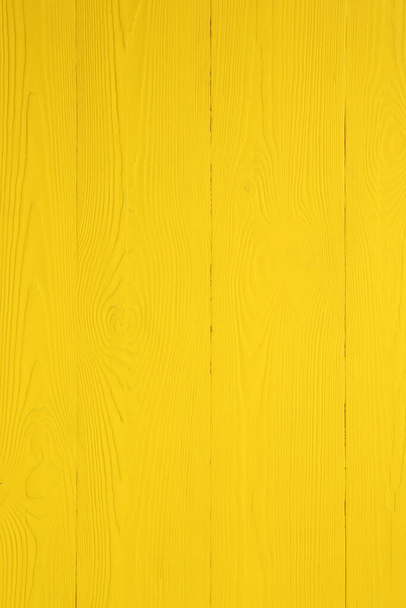 Texture of yellow wooden surface as background, closeup - Foto, immagini