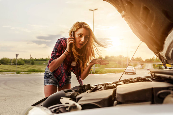 young woman with broken car on the road  - Photo, Image