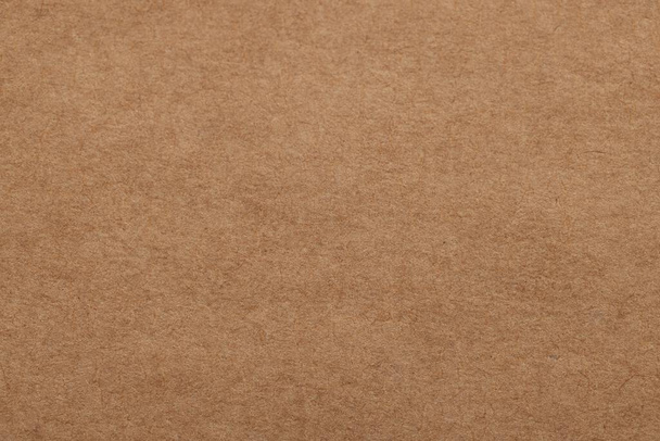Texture of brown paper sheet as background, top view - Fotoğraf, Görsel