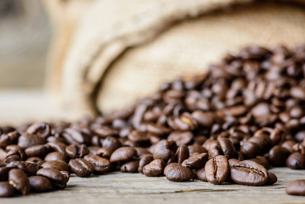 close up of coffee beans on table. selective focus. - 写真・画像