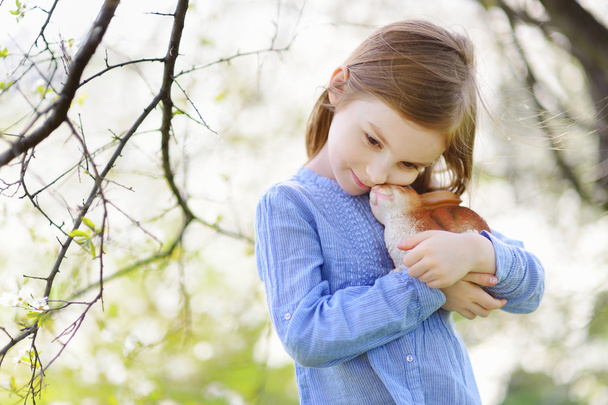 Little girl holding easter bunny - Photo, Image