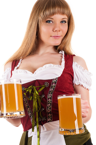 Seductive woman Oktoberfest with beer in hand - Photo, image