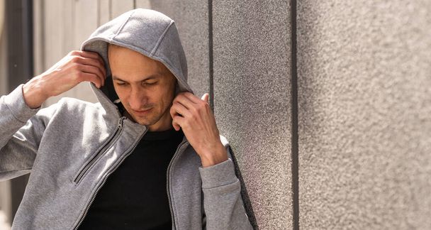 shot of young handsome male wears casual grey sweater. - Φωτογραφία, εικόνα