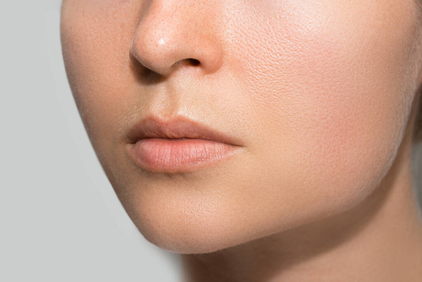Close-up of natural female lips without makeup - Fotoğraf, Görsel