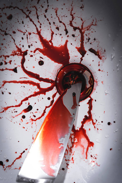 Closeup of dirty bathroom sink with blood splatter and knife - Zdjęcie, obraz