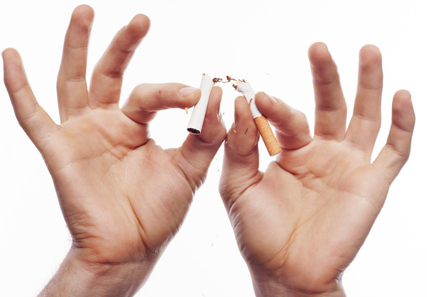 Hand crushing cigarette - Photo, Image