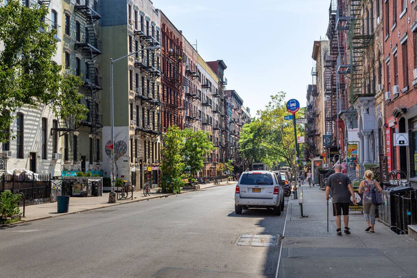 Apartment-lined street in the East Village area of lower Manhattan Island, New York City. - Fotoğraf, Görsel