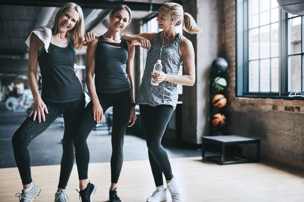 Fitness is for everyone. Full length portrait of three attractive and athletic women working out in the gym - Photo, image
