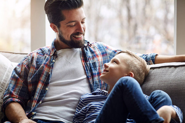You alright buddy. a father and his little son bonding together at home - Photo, Image