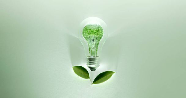 Зеленые энергетические концепции. Беспроводная лампочка с зеленым леафом в качестве сигнала включения света. Углеродная нейтраль и выбросы, эмиссия чистой энергии. Устойчивые ресурсы, возобновляемые источники энергии и охрана окружающей среды - Фото, изображение