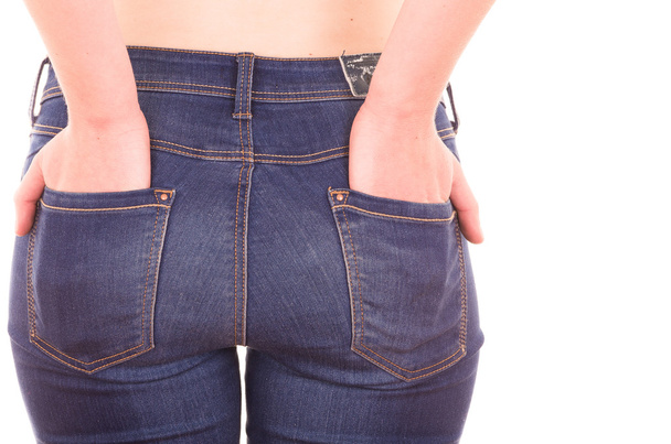 beautiful young slim topless woman wearing jeans showing belly - Fotoğraf, Görsel