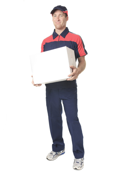 Delivery person delivering packages holding clipboard and packag - Photo, image
