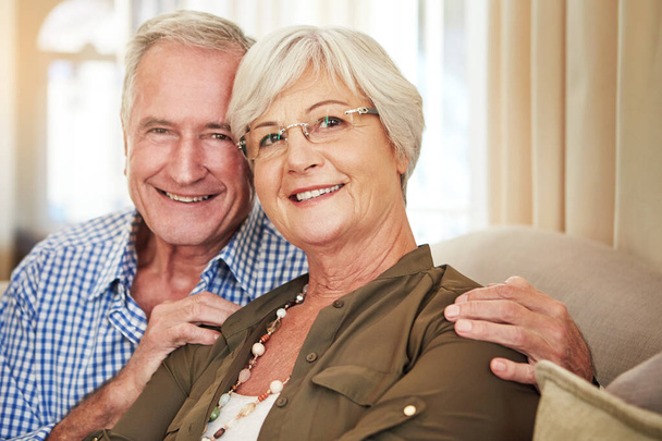 Weve been happy since day one. Cropped portrait of a senior couple at home - Photo, Image