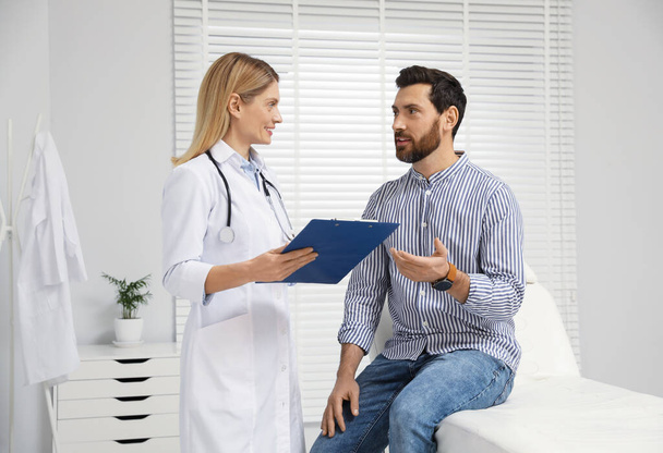 Patient having appointment with doctor in clinic - Photo, image