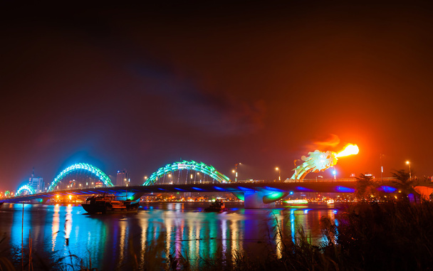 Turquoise Dragon bridge with flame in Danang Vietnam - Photo, image
