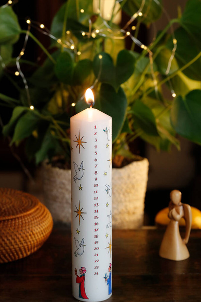 A Christmas advent candle.  France.  - Foto, afbeelding