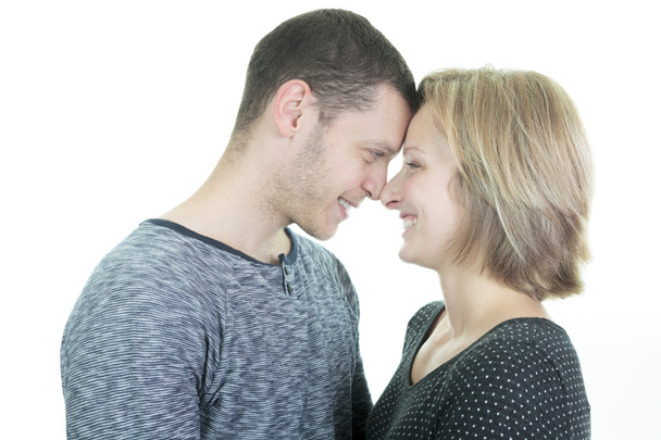 A 30 years old couple  in studio white - Foto, afbeelding