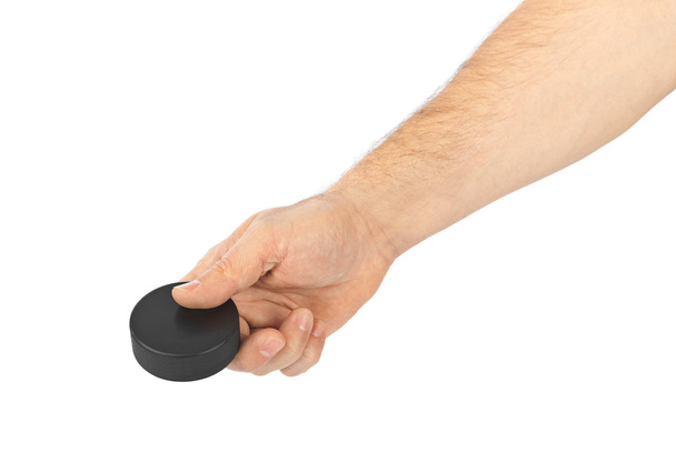 Hand with hockey puck - Foto, immagini