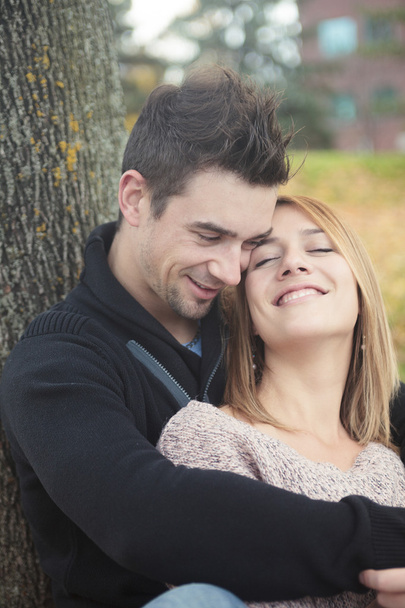 A Young happy couple in autumn season - Foto, Bild